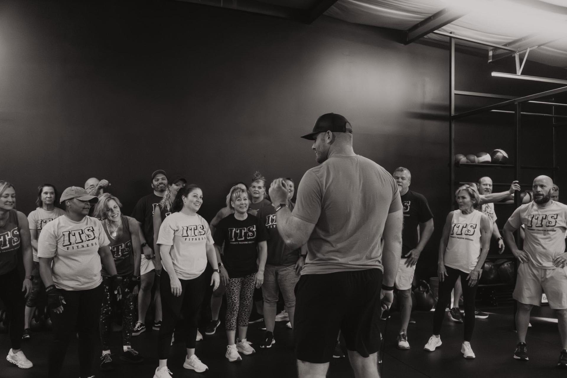Levi Memmer, owner and head coach of I.T.S., coaching a class of members